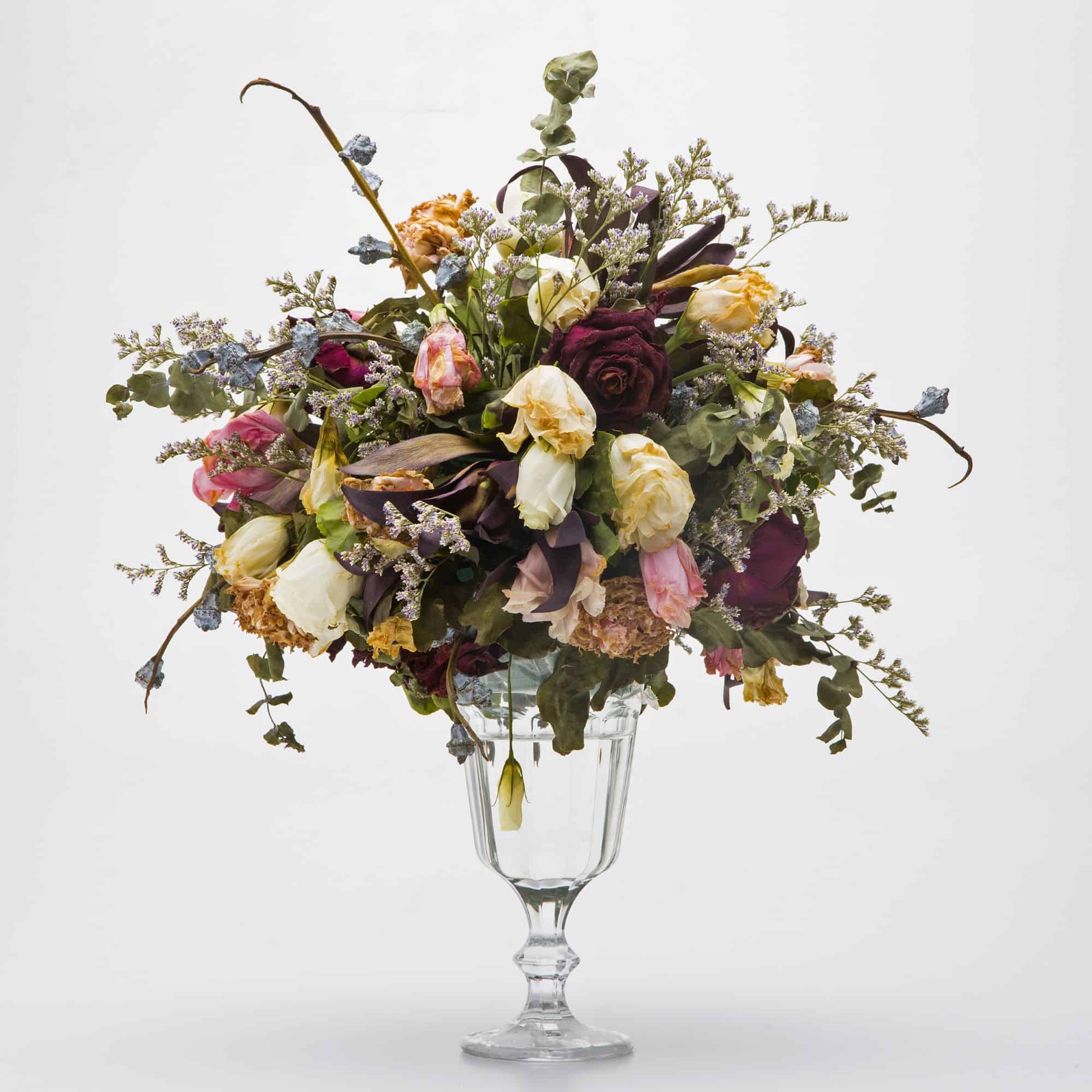 bouquest of dried flowers in a glass vase