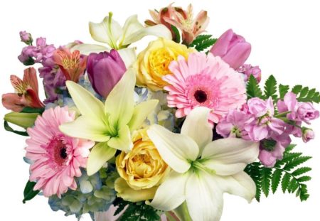 Make the day special by sending this gorgeous mix of pastel-colored flowers put together in a glass cylinder vase.