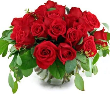 Two dozen exquisite roses and assorted foliage fill a nice glass bubble bowl.