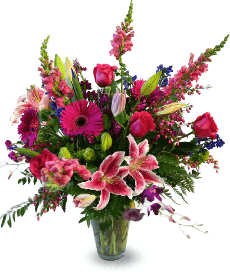 A lovely mixture of bright colors and an assortment of flowers make this design exquisite. Delightfully arranged in a tall vase with a colorful wire accent. Bring your Garden into any room of the house!